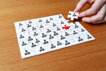 Hr recruitment jigsaw puzzle concept finding talent and building a strong team work