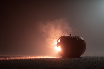 Smoky Glowing Jack-o'-lantern in Halloween Night