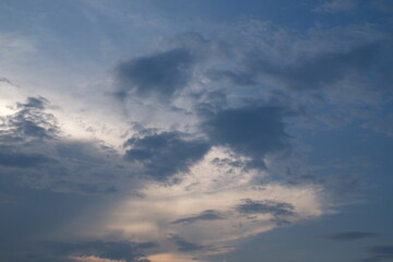 Stormy sky with dramatic clouds from an approaching thunderstorm at sunset. High quality photo