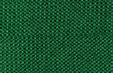 Dark green tight-weave fabric texture. Versatile background for textile design, apparel mockups, or posters.