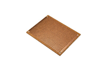 Copper prototyping board with drilled holes is isolated.