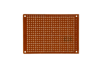 Perforated prototyping board with alphanumeric coordinates is isolated.
