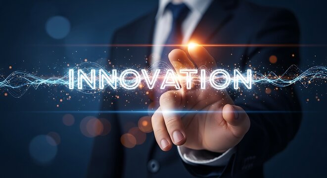 Businessman's hand touching the glowing word INNOVATION with digital light trails on a dark blue background