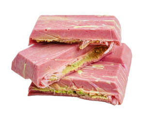 Pieces of pink Dubai chocolate with pistachio filling on a light background