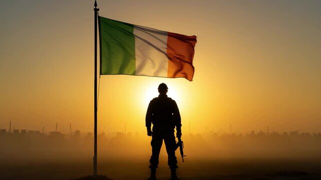Soldier silhouette with Italy flag waving on a golden sunset