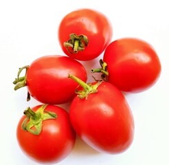 Fresh tomatoes isolated on white background