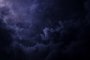 Mystical Sky: A captivating image captures the serene expanse of the night sky, adorned with celestial bodies. Moody clouds in shades of indigo and navy engulf the canvas.