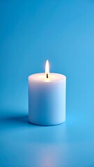 Single white candle on vibrant blue background