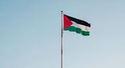 Palestinian Flag Flying on Clear Sky Day in Outdoor Setting