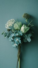 Delicate floral arrangement of white and green blooms against a soft teal background, showcasing elegant botanical composition with subtle texture and minimalist style