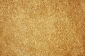Brown orange yellow champagne gold golden beige rough grunge background. Soft pale shade. Close-up....