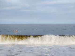 Paddling through the water 