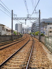 Fototapeta premium 高架線に上る能勢電鉄妙見線の線路
