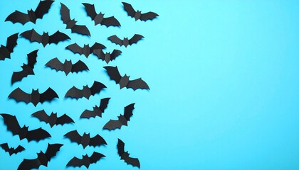 Halloween Background with Paper Bats on Blue Copy Space