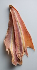 Dried fish slices, light orange-pink