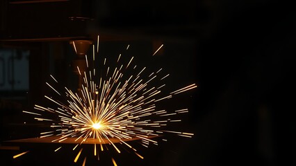 Abstract metalworking scene with glowing sparks, dramatic lighting creating a dynamic atmosphere.
