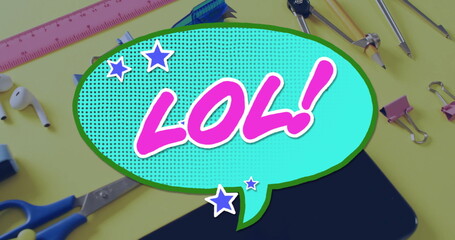 Displaying comic-style speech bubble featuring LOL letters on study desk, with ruler and earbuds