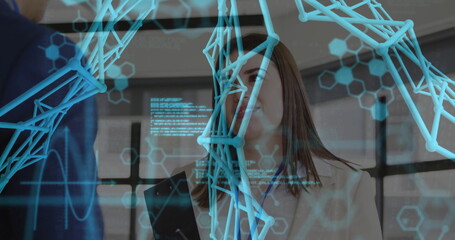 Viewing woman in blazer holding tablet and coworker in suit examining 3D molecular model in office