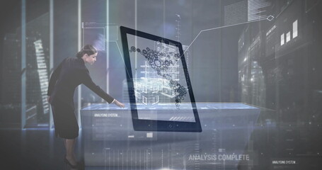 Monitoring engineer manipulating floating 3D display in technology lab wearing suit, copy space
