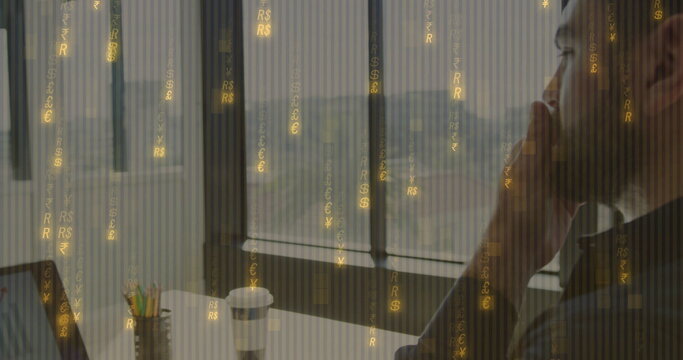 Man in sweater gazing through office window, with laptop, floating currency symbols, copy space - Powered by Adobe