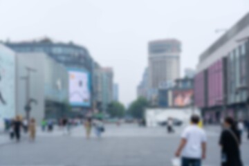 A blurred view of a busy city street in Hangzhou, China.