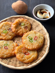 Crispy fritters with scallions and chili peppers.