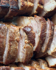 Succulent roasted pork slices with crisp crust.