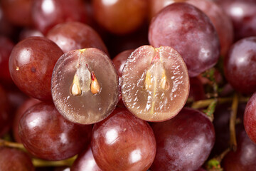 Close up of peeled sweet red grapes background	