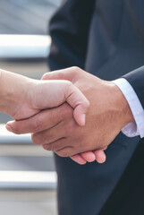 Vertical handshake together Lawyer partnership Businessman Notary lawfirm. Vertical Two Men Trust...