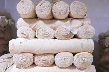   Terry Cloth Fabric Rolls – Toweling Textile Material, Stack of Folded Towels – Soft Bath Towels on Display