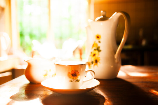 Inviting Floral Tea Set in Soft Morning Light &ndash; Cozy Breakfast Table Scene