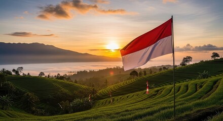 Sunrise over hills with national flag