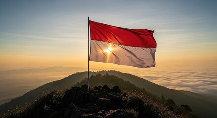 Waving flag on mountaintop sunrise