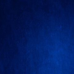 Black dark blue cobalt background texture. Concrete wall surface. Close-up. Paint plaster. Grunge...