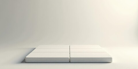 A Minimalist White Platform Consisting of Four Seamless Square Sections Set Against a Plain White Background, Ideal for Product Displays or Abstract Compositions