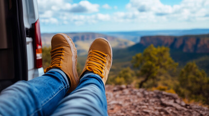 Relaxing with Hiking Boots by Scenic Mountain Overlook during Beautiful Outdoor Adventure