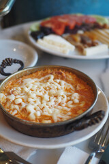 Delicious turkish menemen on a table 
