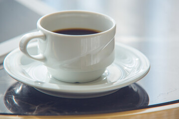 Cozy Hotel Room with Tea Service – Woman Enjoying The Moment,Woman Drinking Tea in Comfortable Hotel Room – Relaxing Hospitality Scene