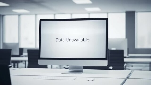Computer monitor displaying 'Data Unavailable' message in a modern office, symbolizing technical error or missing information