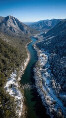 Snowy mountain valley river