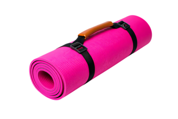 Bright pink yoga mat rolled and secured with black straps and a brown handle on a black background