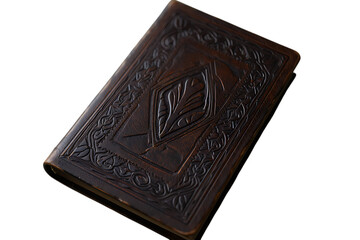 Fototapeta premium Ornate antique-style dark brown leather-bound journal with intricate Celtic embossed patterns.
