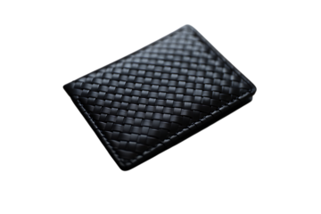 Black woven leather wallet or card holder with intricate texture on a dark background.