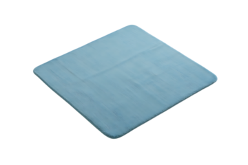 Soft light blue textured square rug or bath mat with rounded corners on a black background