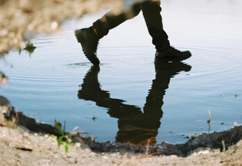 water flowing into a puddle