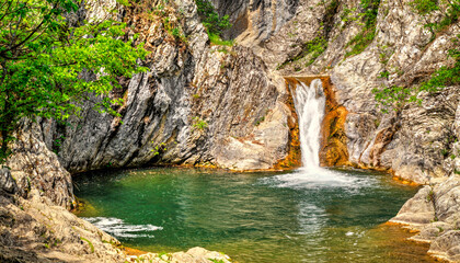 Beautiful landscape with waterfall in the mountain