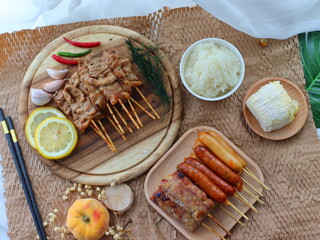 Moo Ping (Thai grilled pork skewers) — a beloved Thai street food made from marinated pork grilled over charcoal. Tender, juicy, and smoky, these skewers are commonly served with sticky rice for a fla