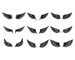 Vector set of black wing icons. Angel, eagle, and bird wing silhouettes for tattoo, heraldry, and logo design elements.