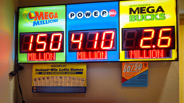 Cadott, Wisconsin (USA) - August 3, 2025: Closeup of a sign showing jackpot amounts for various lottery games, including Mega Millions, PowerBall, and Wisconsin MegaBucks. Editorial Use Only.