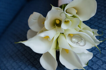 Close-Up of Rings on Bridal Flowers